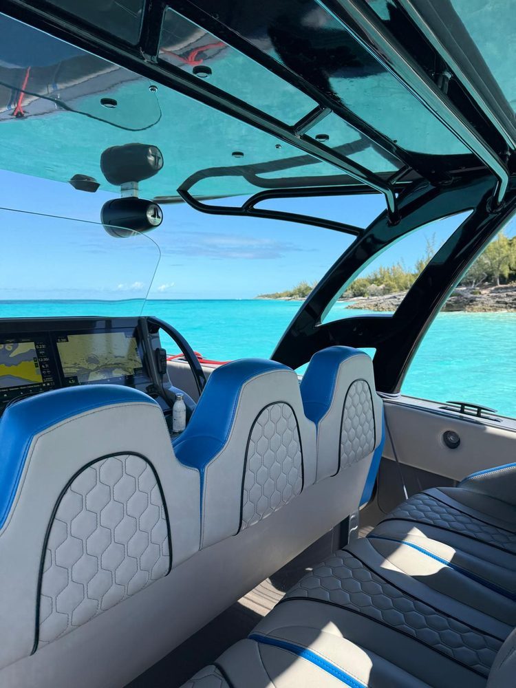 Helm and seating with turquoise Bahamas water