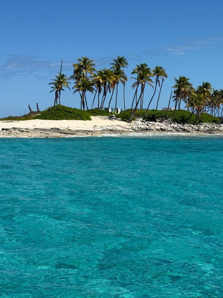 View from deck across turquoise water